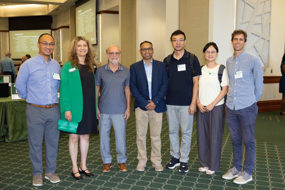 Faculty from the Klein College of Science with Dean Bernadette Donovan-Merkert.
