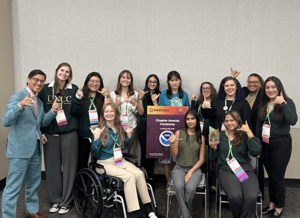 UNC Charlotte's student organization of SACNAS posing together