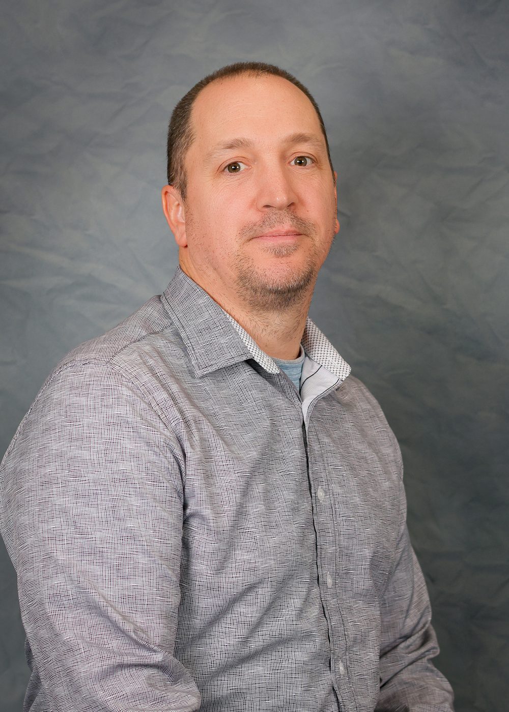 Headshot of Ritchie Dudley, Assistant Teaching Professor in the UNC Charlotte Klein College of Science